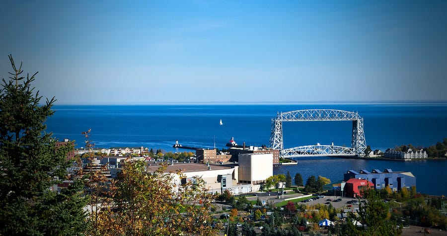 Lake Superior is seen beyond the iconic Duluth, Minnesota Aerial Lift Bridge, things to do in Duluth